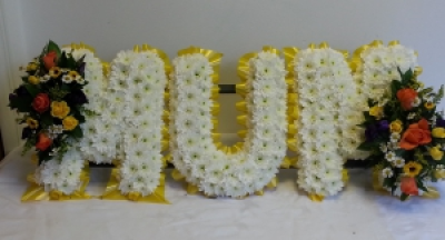 Letters - each letter is priced at £40 and the florist can make this tribute in any combination of letters or words eg. dad, sister, etc.
