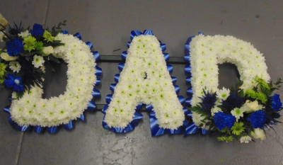 Letters - Any words can be done...only £35 a letter.

This is for a standard size letter with ribbon edge and based with chrysanthemums.

The total price also includes the arrangements (as shown in the photos)

The Photograph is to show an example of what can be done
